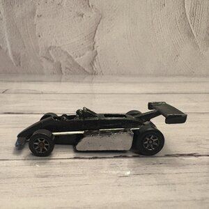 Hot Wheels 1982 Black Silver Spoiler Indy Formula 1 Diecast Toy Car (SKU: 322TO)